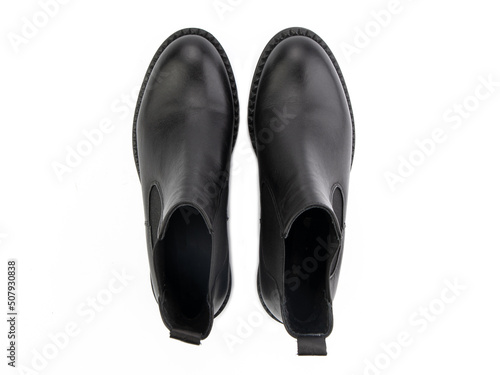 Obraz na płótnie black leather jodhpur boots isolated on white background. Top view. Fashion shoes. Photoshoot for shoe shop concept. w salonie