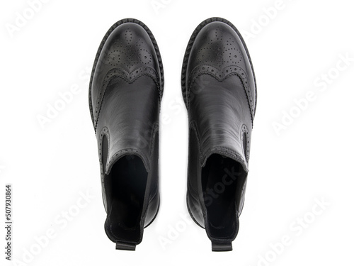 Obraz na płótnie black leather jodhpur boots isolated on white background. Top view. Fashion shoes. Photoshoot for shoe shop concept. w salonie