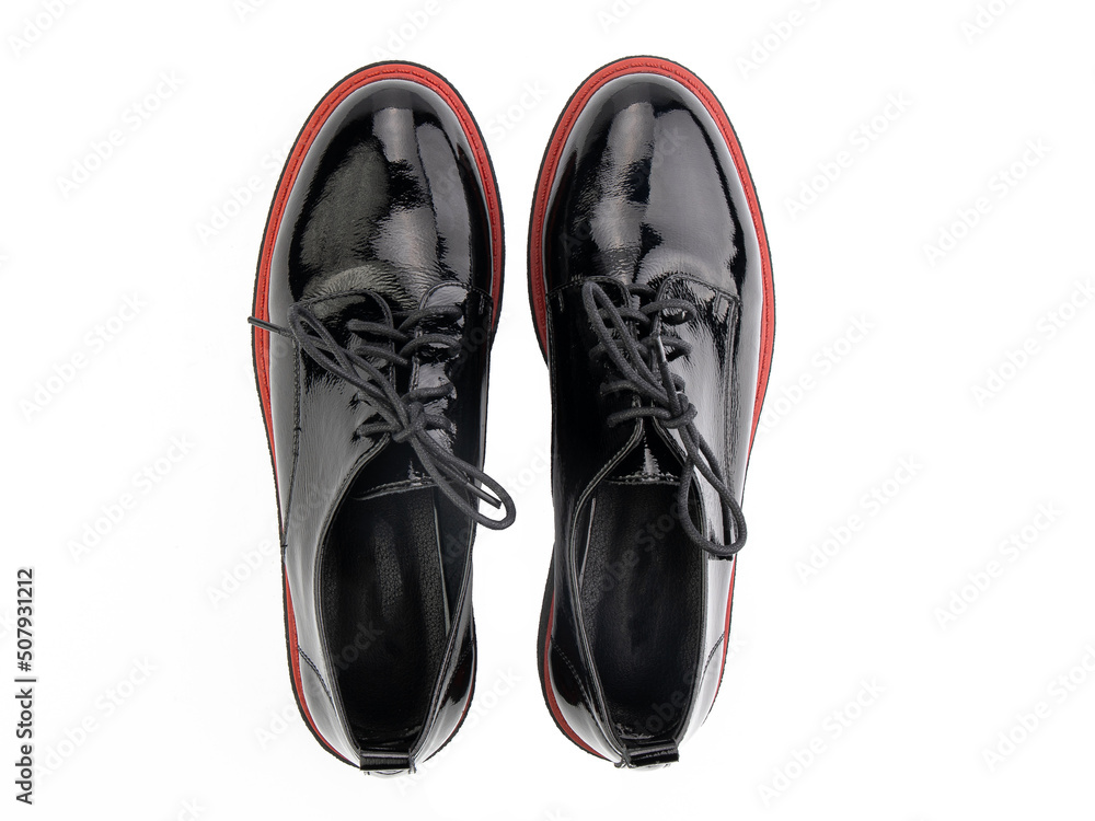black leather jodhpur boots isolated on white background. Top view. Fashion shoes. Photoshoot for shoe shop concept.