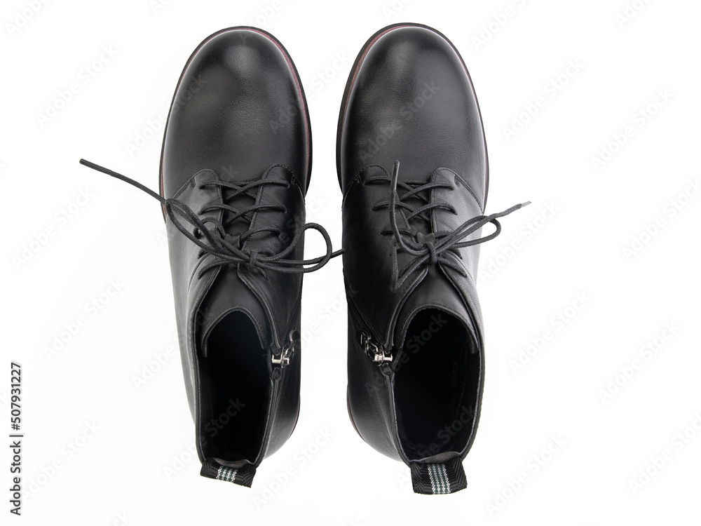 black leather jodhpur boots isolated on white background. Top view. Fashion shoes. Photoshoot for shoe shop concept.