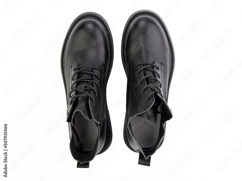 black leather jodhpur boots isolated on white background. Top view. Fashion shoes. Photoshoot for shoe shop concept.