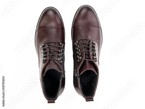 Obraz na płótnie A pair of classic leather elegant men's shoes isolated white background. Groom's stylish black shoes. Isolated object close up on white background. w salonie