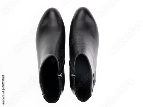 Obraz na płótnie black leather jodhpur boots isolated on white background. Top view. Fashion shoes. Photoshoot for shoe shop concept. w salonie