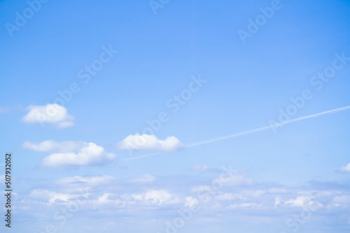 Cumulus clouds. White clouds on a blue background.