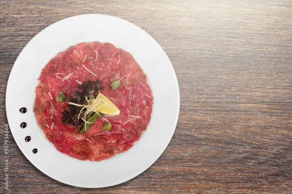 Traditional spanish jamon, prosciutto crudo, italian salami, parma ham on a plate. Traditional spanish jamon, prosciutto crudo, italian salami, parma ham on a plate.