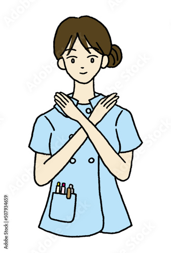 ノーのポーズをする女性看護師