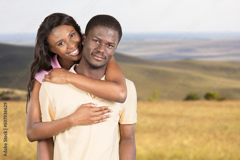Portrait of a couple man carrying woman lover anjoying sunlight weekend vacation holidays concept Portrait of a couple man carrying woman lover anjoying sunlight weekend vacation holidays concept