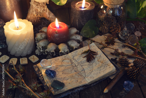 Wicca, esoteric and occult still life with vintage magic objects and candles on witch table altar for mystic rituals and fortune telling Fototapet