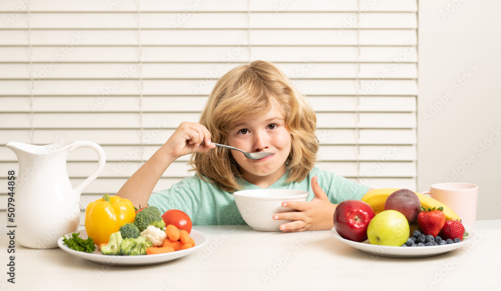 Morning snack with muesli cereal granola. Healthy nutrition for children. Child enjoy eating for breakfast or dinner with appetite. Hungry child eat tasty fruits and vegetables. Morning snack with muesli cereal granola. Healthy nutrition for children. Child enjoy eating for breakfast or dinner with appetite. Hungry child eat tasty fruits and vegetables.