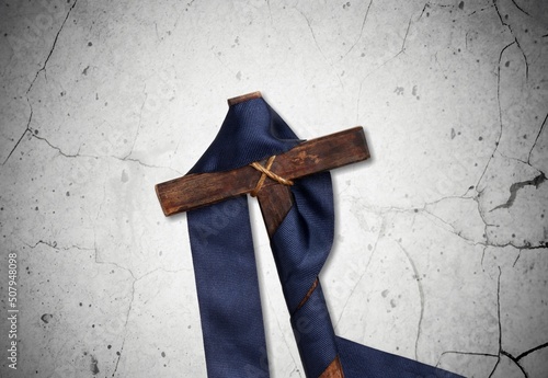 Wooden cross on a background. Christian religion.
