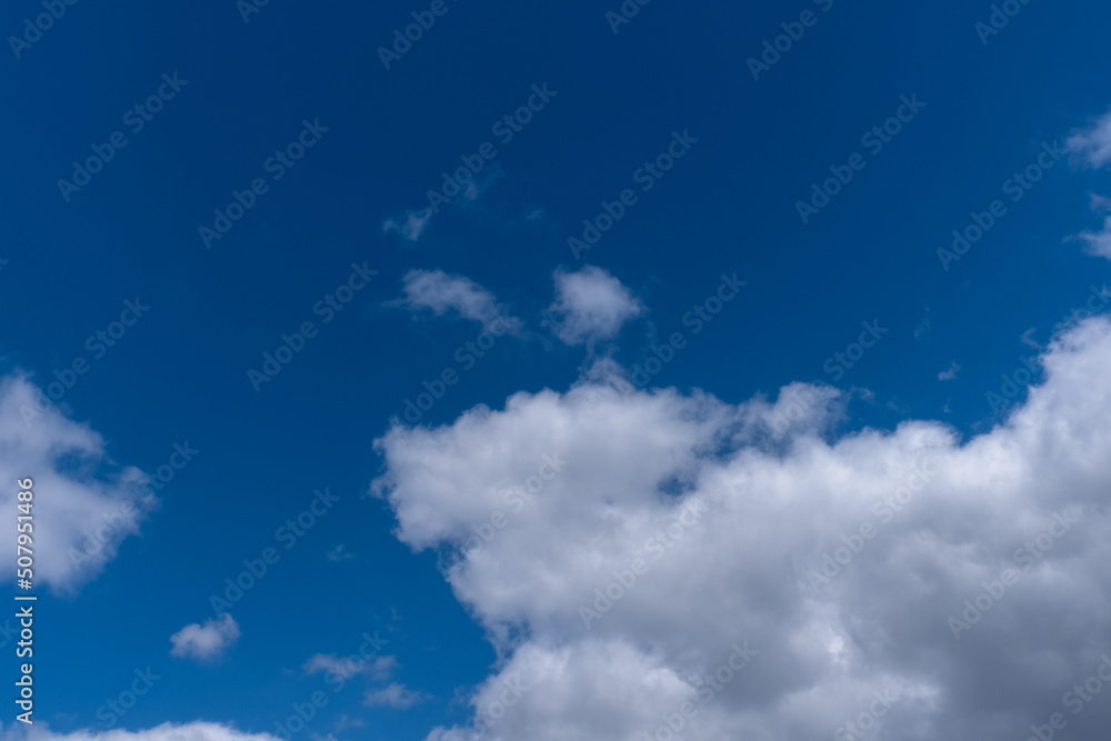 white clouds in the blue sky. cumulus. white clouds in the blue sky. cumulus.