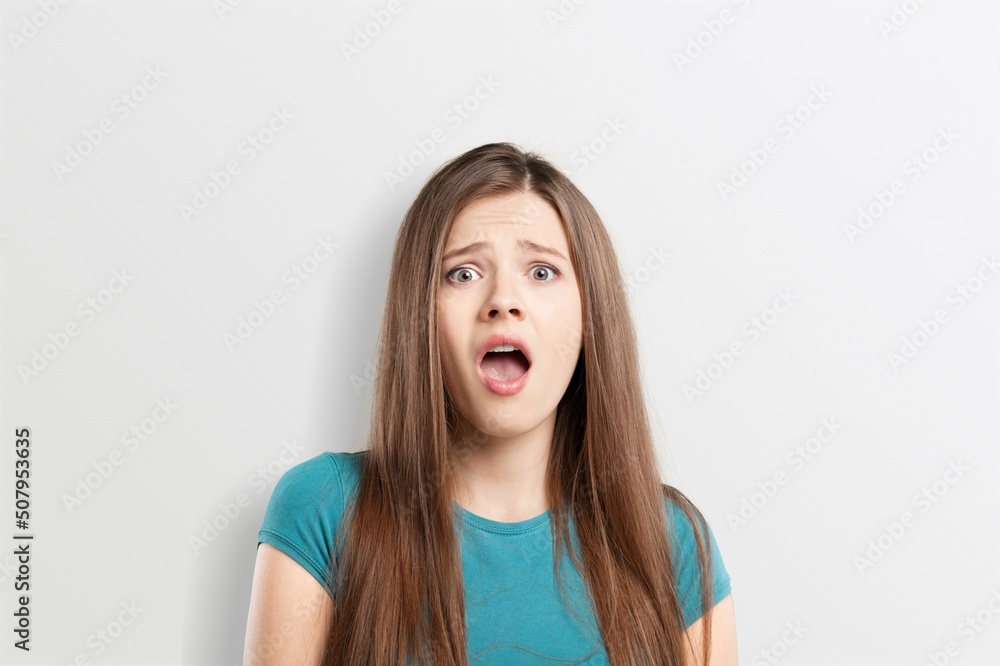 Image of sad office girl, woman sulking and frowning disappointed, standing upset and distressed Image of sad office girl, woman sulking and frowning disappointed, standing upset and distressed