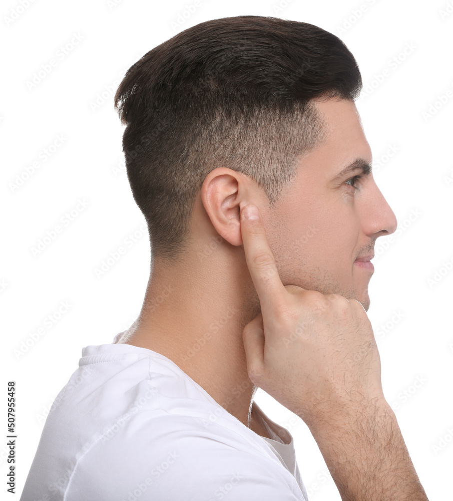 Man pointing at his ear on white background Man pointing at his ear on white background