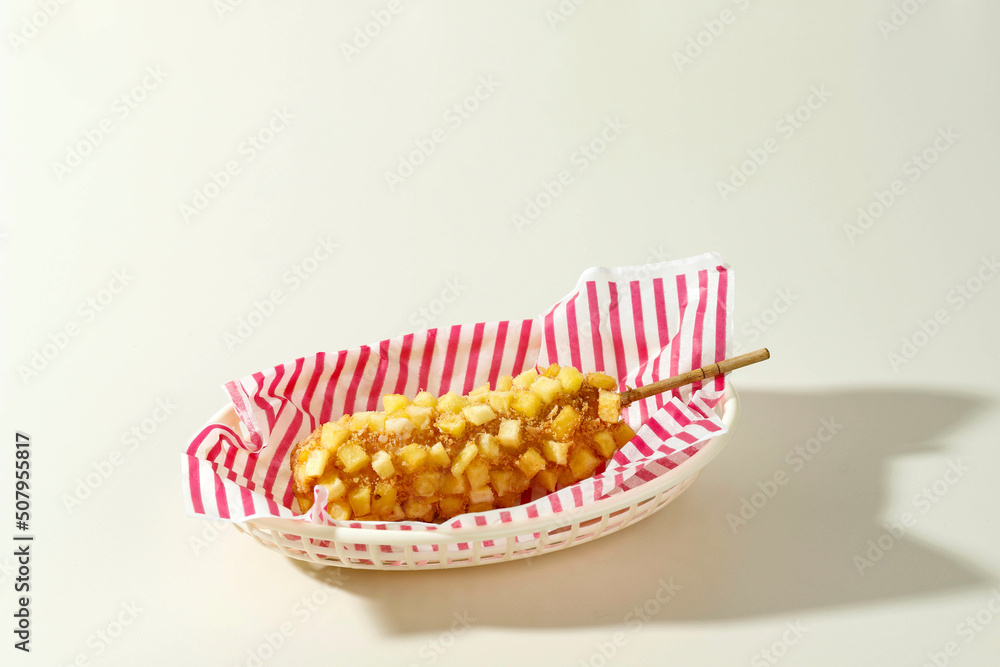 Delicious Crunchy Korean Style Chunky Potato Corn Dogs with Batter and Fried Potatoes. - obrazy, fototapety, plakaty 