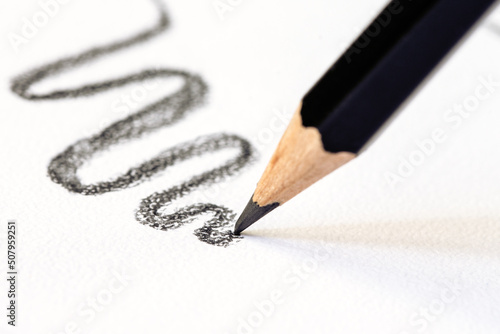 Bilde på lerret a graphite pencil draws a gray line
