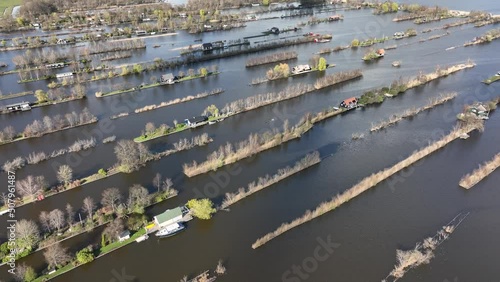 Loosdrechtse plassen harbour waterway canals and cultivated ditch nature near Vinkeveen Utrecht. Lake and water fields small islands and structured nature. Typical dutch holland sight touristic. photo