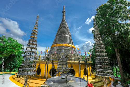 Background of religious sights on high mountains in Hat Yai District of Thailand (Phra Maha Ruesee Chedi Tripob Trimongkol) is a beautiful stainless steel pagoda, tourists always come to make merit du