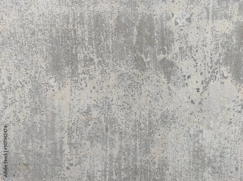 Cement wall background. Texture placed over an object to create a grunge effect for your design.Wall dark scary. Dark cement for background. Horrible wall full of scratches.Empty grey concrete texture © prateek
