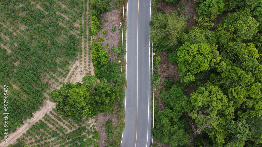 top view of road aerial view tropical mountains landscape. top view of road aerial view tropical mountains landscape.