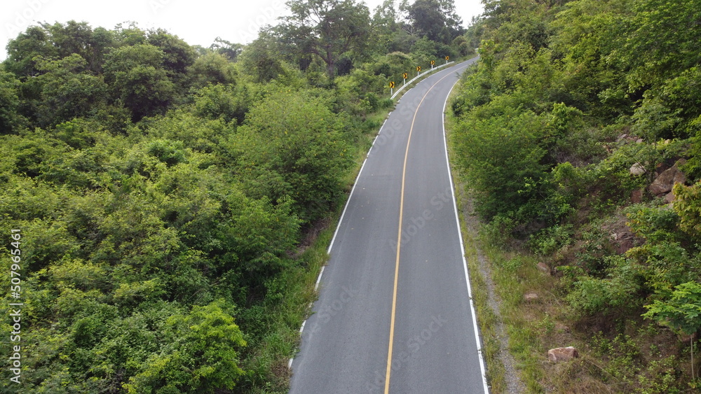 top view of road aerial view tropical mountains landscape. top view of road aerial view tropical mountains landscape.