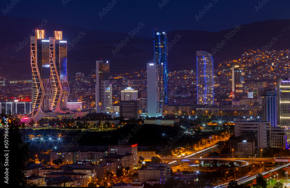 Bayrakli, Karsiyaka, Izmir, Turkey : May 2, 2022, View of Izmir Bay in the evening from the high hill of Bayrakli. Long exposure, low light. Bayrakli, Karsiyaka, Izmir, Turkey : May 2, 2022, View of Izmir Bay in the evening from the high hill of Bayrakli. Long exposure, low light.