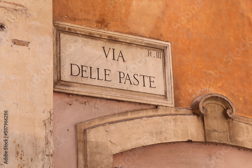 Fototapeta Naklejka Na Ścianę i Meble -  Rome Street View with House Facade Detail and Street Sign, Italy
