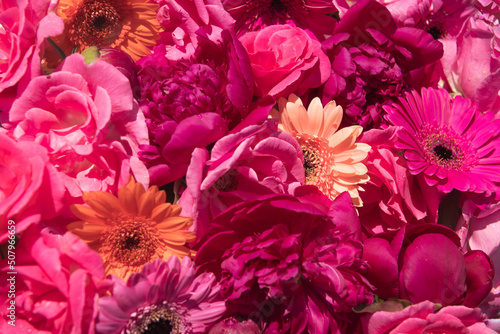 Abstract seamless red, pink and orange roses, peonies and gerbera flowers  photo