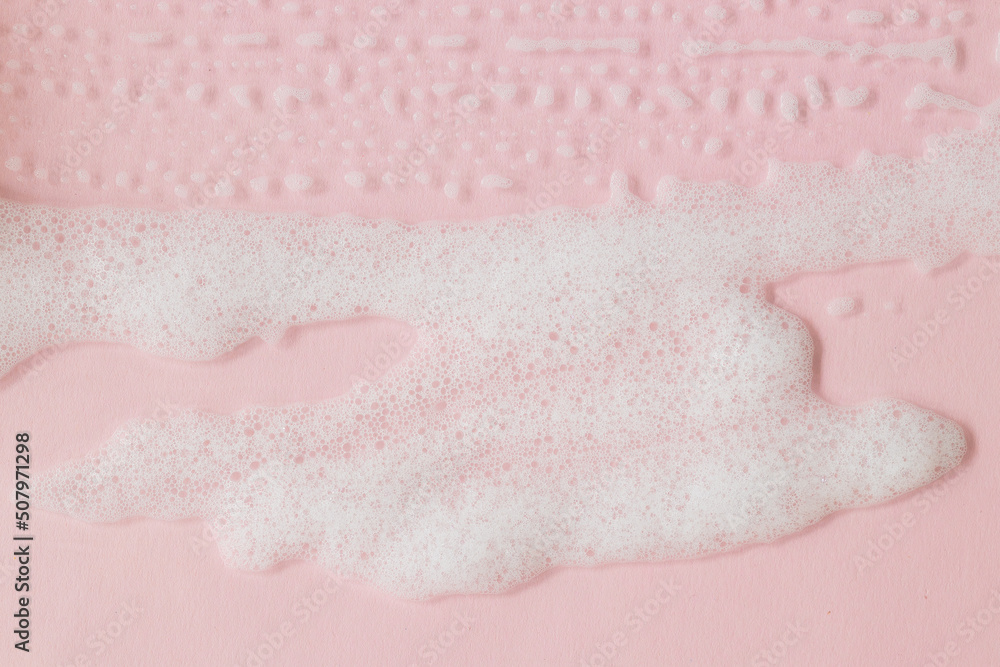Soap foam Shaving cream bubble isolated on pink background