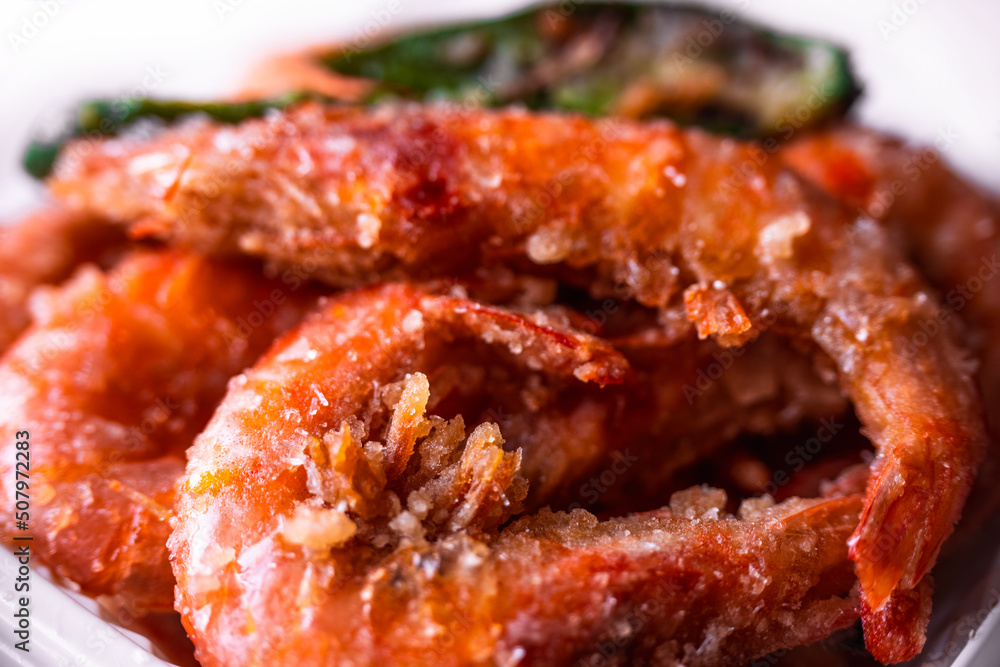 Fried king shrimps close-up, tasty, crispy, large, photo with shallow depth of field. Delicious food concept. Fried king shrimps close-up, tasty, crispy, large, photo with shallow depth of field. Delicious food concept.