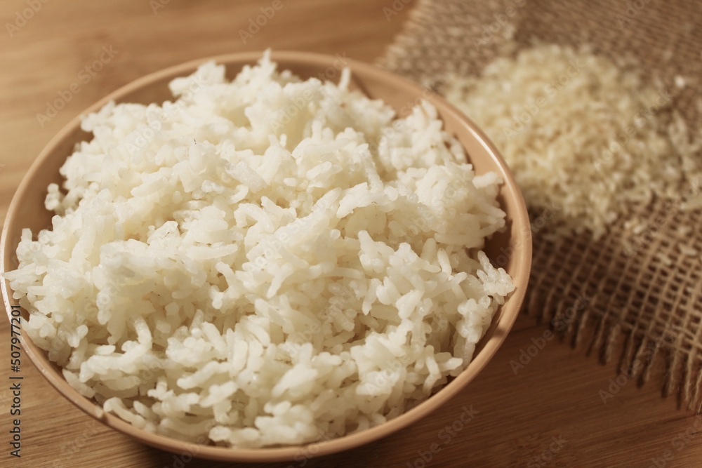 Cup of rice. Boiled rice in a bowl. steamed white rice in a ceramic bowl. Cup of rice. Boiled rice in a bowl. steamed white rice in a ceramic bowl.
