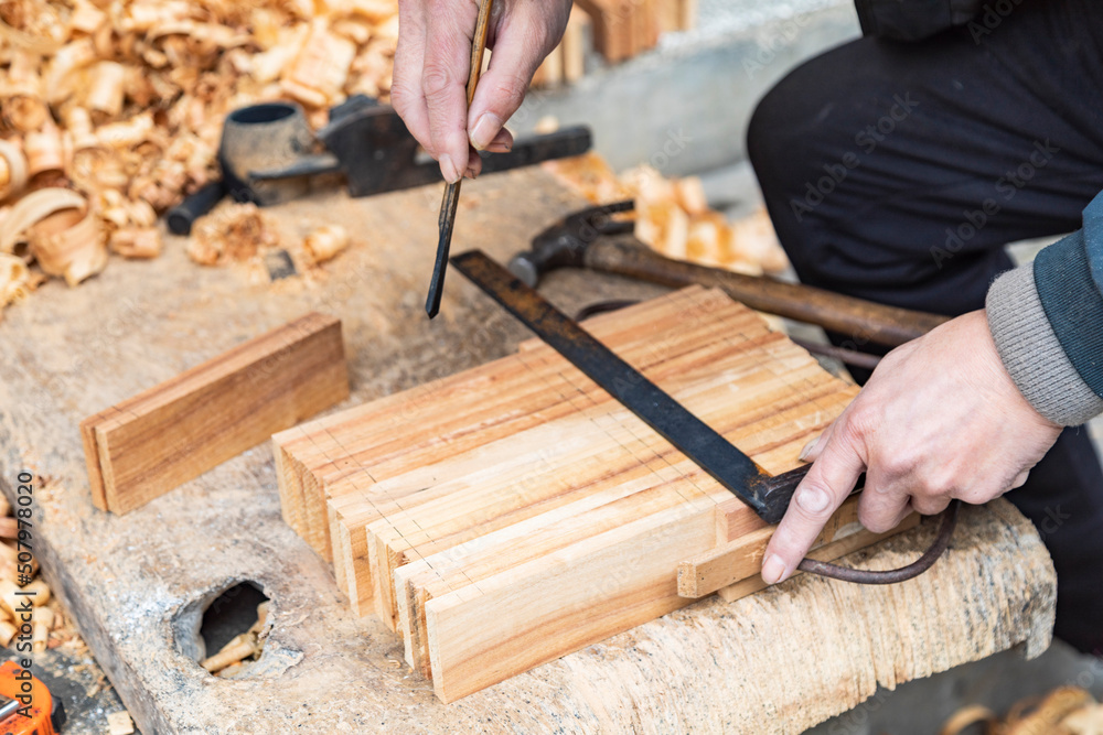 carpenter working with wood