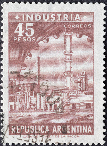 ARGENTINA - CIRCA 1962: a postage stamp from ARGENTINA, showing a petrochemical plant. Circa 1962