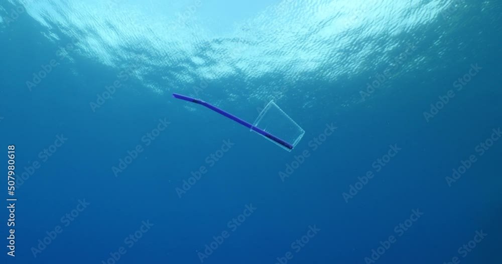 plastic waste underwater bad for fish with sun rays water waves hit to rocks background ocean pollution plastic waste underwater bad for fish with sun rays water waves hit to rocks background ocean pollution