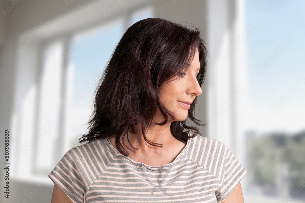 Thoughtful bored older woman looking at window, feeling depressed, frustrated, lonely, suffering form memory loss, dementia Thoughtful bored older woman looking at window, feeling depressed, frustrated, lonely, suffering form memory loss, dementia