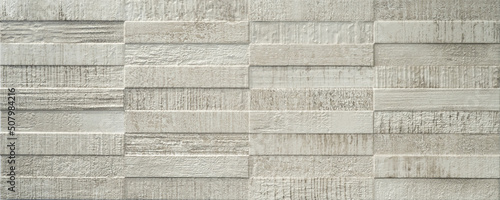 Beige gray grey rectangular concrete cement stone ceramic mosaic tile mirror, 3D tiles wall texture background © Corri Seizinger
