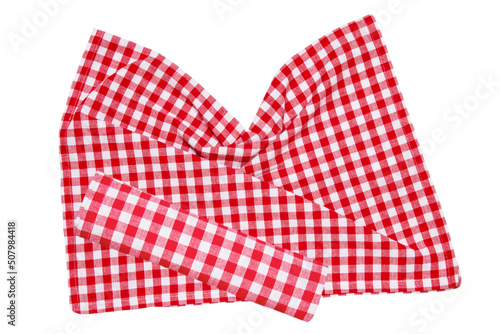 Red picnic blanket. Closeup of a red checkered napkin or tablecloth texture isolated on a white background. Beautiful backdrop for your product placement or montage.