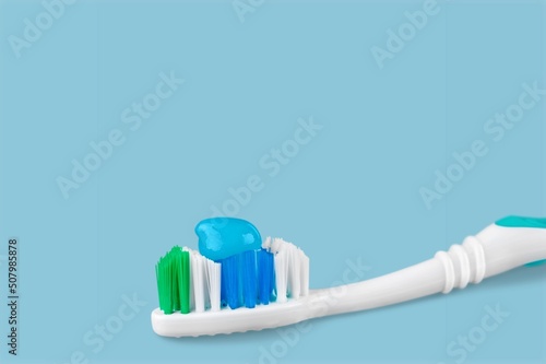 Classic plastic toothbrush. Natural toothpaste concept