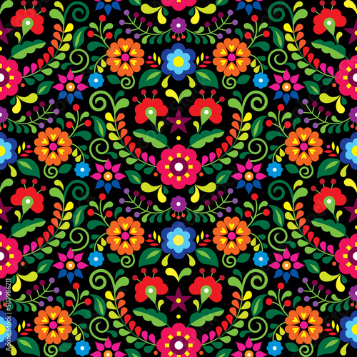 Mexican folk art vector seamless pattern with flowers, textile or fabric print design inspired by traditional embroidery ornaments from Mexico on black
 