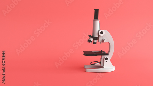 Metal microscope on pink base
