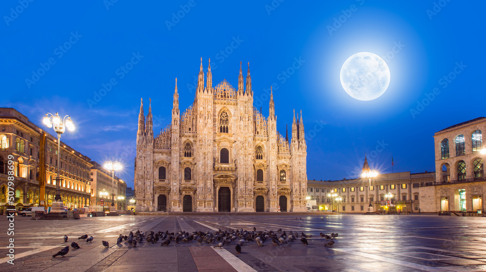 Duomo di Milano (Milan Cathedral) and Piazza del Duomo with full moon - Milan, Italy