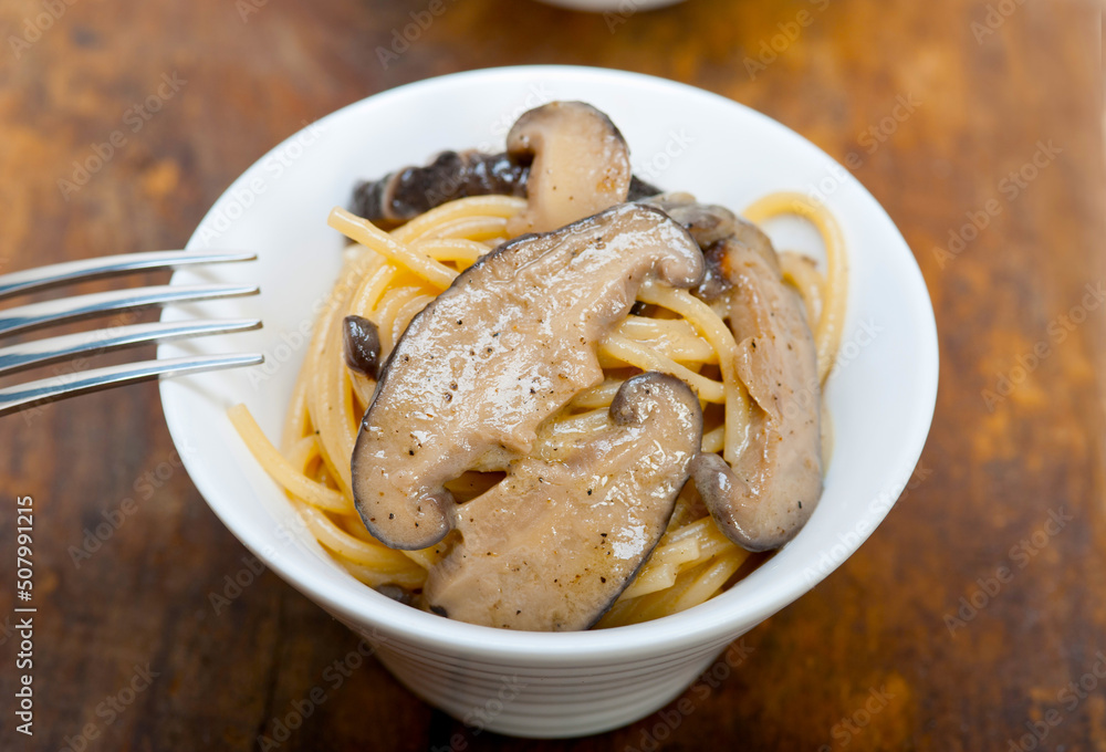 Italian spaghetti pasta and mushrooms Italian spaghetti pasta and mushrooms