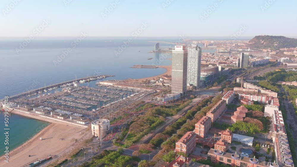 Barcelona, Spain: Aerial view of capital city of Catalonia, coast with beaches, sunny day with clear sky - landscape panorama of Europe from above Barcelona, Spain: Aerial view of capital city of Catalonia, coast with beaches, sunny day with clear sky - landscape panorama of Europe from above