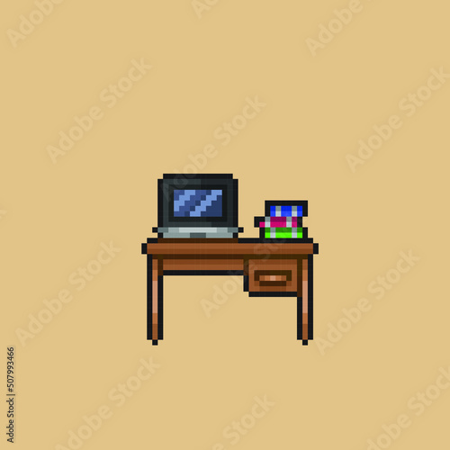 laptop on the desk in pixel art style
