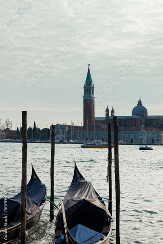 Venice gondolas at the pier in Canale de lla Giudecca