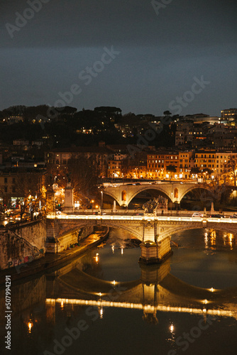 Bridges over Tiber river in Rome at night