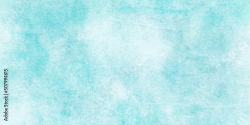 Pastel blue watercolor shaded and painted blue sky background, Bright beautiful cloudy watercolor background, Blue paper texture with scratched and grunge distressed texture.