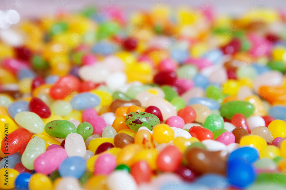 Candy sweets jelly. Close up view of delicious round multicolor sweet candies. Fruit jelly in shop window. Sweets for Easter, Halloween. Unhealthy or organic food. Selective focus Candy sweets jelly. Close up view of delicious round multicolor sweet candies. Fruit jelly in shop window. Sweets for Easter, Halloween. Unhealthy or organic food. Selective focus