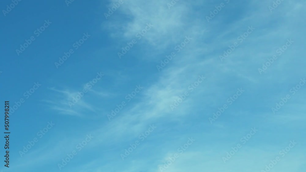 Clear Blue Sky, Light Clouds, Timelapse. Pure Azure Heavenly Heights on Sunny Day, Azone Layer, Height, Beauty, Feathery Cloud. Blue Skyscraper in Sunny Weather. Beautiful Natural Background 4K. Clear Blue Sky, Light Clouds, Timelapse. Pure Azure Heavenly Heights on Sunny Day, Azone Layer, Height, Beauty, Feathery Cloud. Blue Skyscraper in Sunny Weather. Beautiful Natural Background 4K.