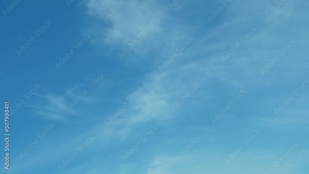 4K Clear Sky Time Lapse, Beautiful Background, Pure Azure Blue Sky Timelapse of Skyscrapers, Blue Sky with Cirrus Light Clouds and Sun Clean Azure Firmament Feathery Clouds. Oxygen Beauty Azone layer 