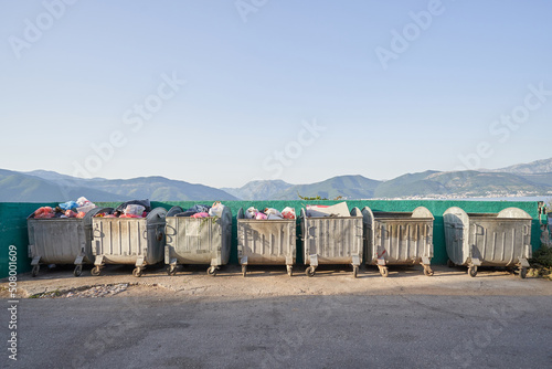 Trash cans on the background of mountains